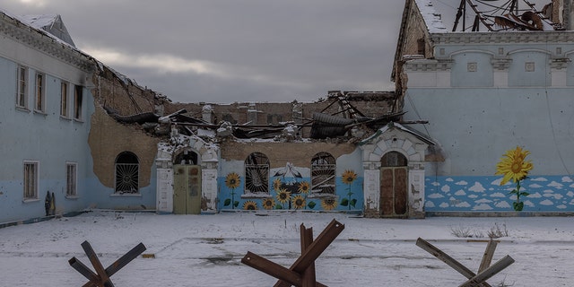 Paintings are seen on a wall of a House of Culture badly damaged during the Russian attacks, on February 7, 2023 in Irpin, Ukraine. 