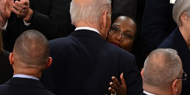 President Biden greets Supreme Court Associate Justice Ketanji Brown Jackson as he arrives to deliver the State of the Union address in the House Chamber of the U.S. Capitol in Washington, D.C., on Tuesday. 
