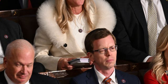 US Republican Representative Marjorie Taylor Greene (R-GA) yells as US President Joe Biden delivers the State of the Union address at the US Capitol in Washington, DC, February 7, 2023.
