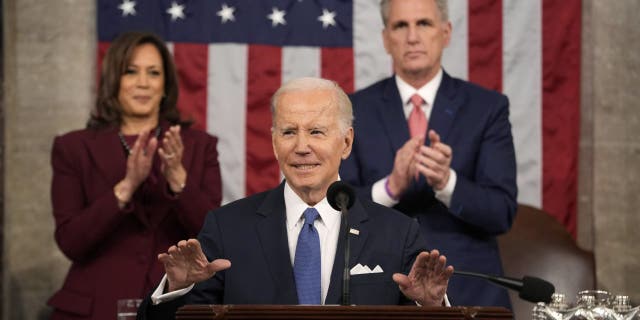 Vice President Kamala Harris and House Speaker Kevin McCarthy applaud during President Biden's State of the Union address at the U.S. Capitol on Tuesday.