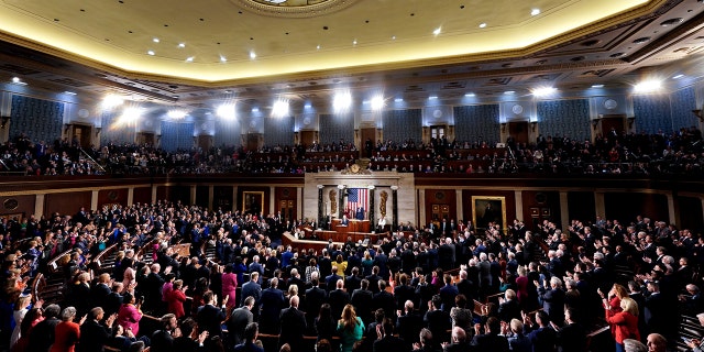 President Biden, center, speaks during a State of the Union address at the U.S. Capitol in Washington, D.C., on Tuesday, Feb. 7, 2023.