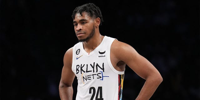 Cam Thomas, #24 of the Brooklyn Nets looks on during the game against the Phoenix Suns at Barclays Center on February 7, 2023 in Brooklyn, New York. 