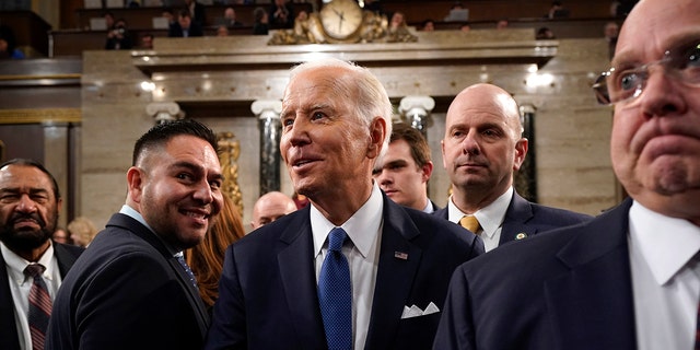 US President Joe Biden exits after delivering the State of the Union address at the US Capitol in Washington, DC,