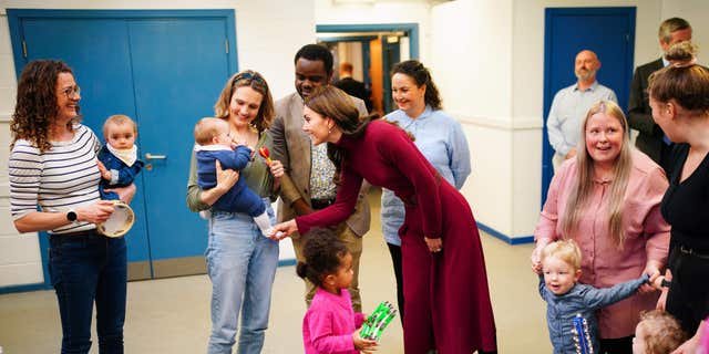 Kate Middleton speaks to children at the Dracaena Center in Falmouth, Cornwall. 