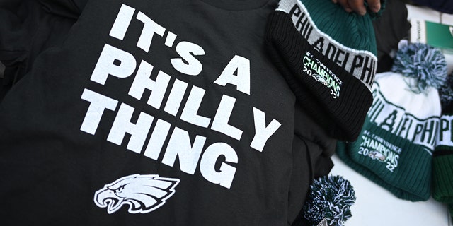 Street vendors sell Philadelphia Eagles themed t-shirts ahead of Super Bowl LVI on February 10, 2023 in Philadelphia, Pennsylvania. 