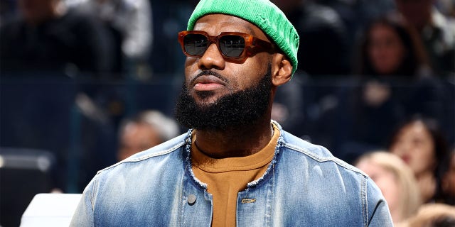 LeBron James of the Los Angeles Lakers looks on from the bench during the Golden State Warriors game on February 11, 2023 at the Chase Center in San Francisco.