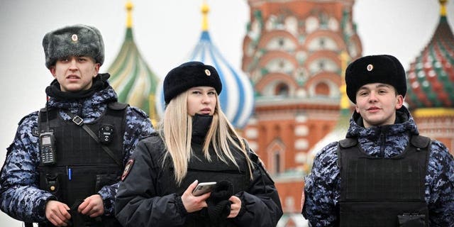 Russian police patrols Red Square in front of St. Basil's Cathedral in central Moscow on Feb. 13, 2023. 