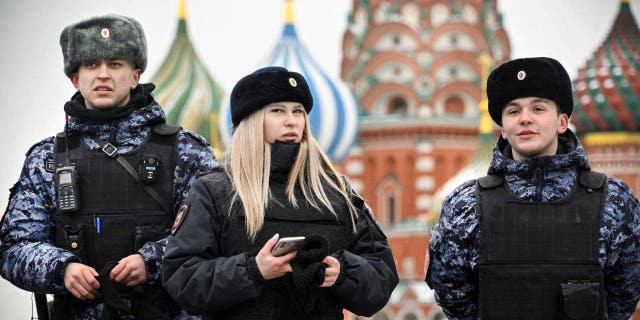 Russian police patrols Red Square in front of St. Basil's Cathedral in central Moscow on Feb. 13, 2023. 