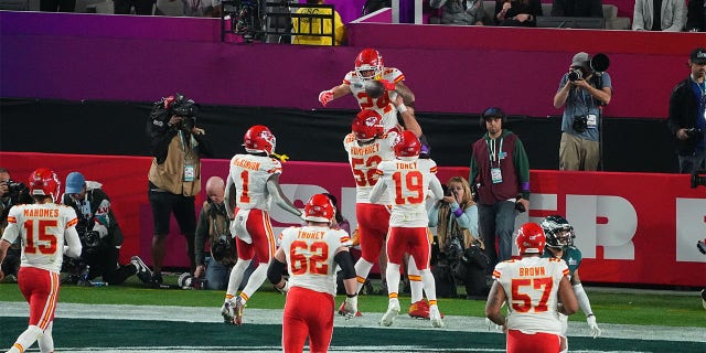Super Bowl LVII: Kansas City Chiefs Skyy Moore (24) in action, celebrates scoring a touchdown vs Philadelphia Eagles at State Farm Stadium. Glendale, AZ.