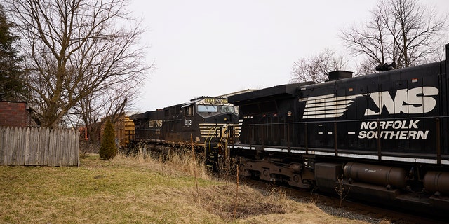 A Norfolk Southern train is en route on February 14, 2023, in East Palestine, Ohio. 