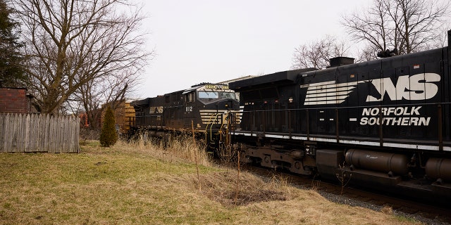 A Norfolk Southern train is en route on February 14, 2023, in East Palestine, Ohio. 