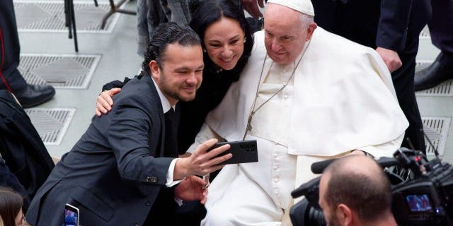 Pope Francis poses for a selfie at the end of his general audience at Paul VI Audience Hall, Vatican City.