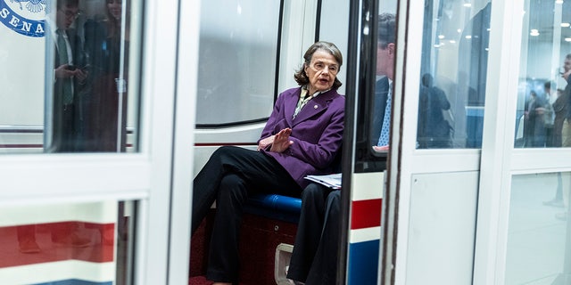 Sen. Dianne Feinstein sits on a subway