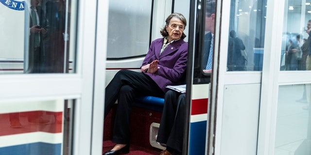 Sen. Dianne Feinstein sits on a subway