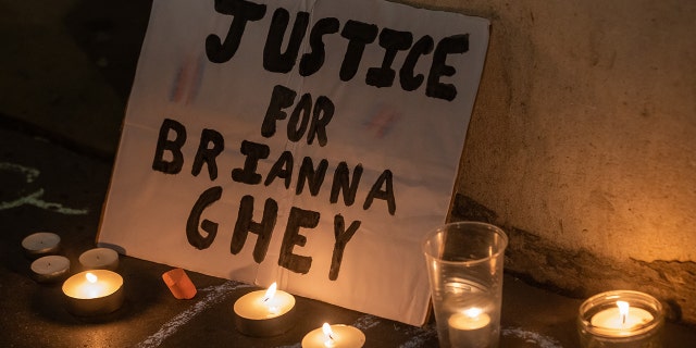 A sign and candles are pictured at a vigil for transgender teenager Brianna Ghey held outside the Department for Education by thousands of transgender people and supporters on 15 February 2023 in London, United Kingdom.