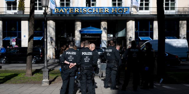 Police officers stand in front of the Hotel Bayerischer Hof, where the 59th Munich Security Conference will be held from Feb. 17 to 19, 2023. 