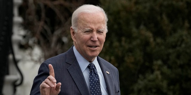 U.S. President Joe Biden gestures toward reporters as he walks toward Marine One on the South Lawn of the White House February 16, 2023, in Washington, D.C.