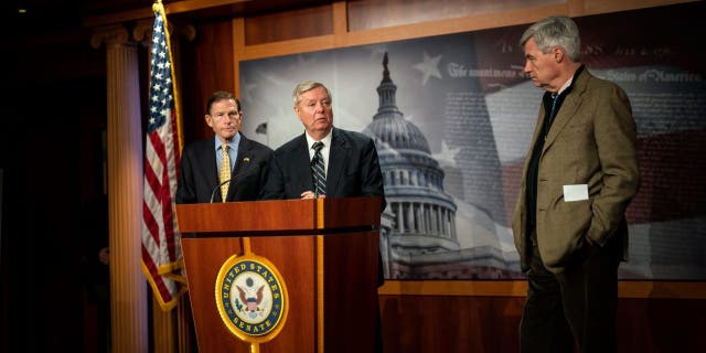 Sens. Richard Blumenthal, D-Conn., Lindsey Graham, R-S.C., and Sen. Sheldon Whitehouse, D-R.I., introduce their legislation to designate The Wagner Group an international terrorist organization at the U.S. Capitol on Thursday, Feb. 16, 2023.