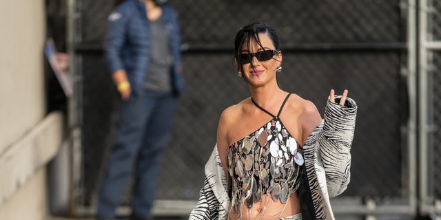 Katy Perry flashed a peace sign as she arrived to film "Jimmy Kimmel Live" on Thursday.