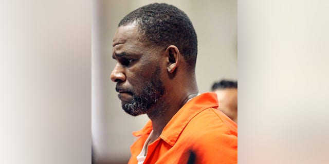 R. Kelly appeared in court wearing an orange jumpsuit in 2019.