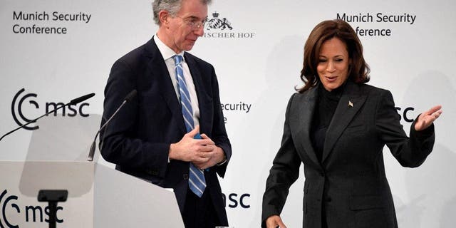 Vice President Kamala Harris stands on stage with the Chairman of the Munich Security Conference (MSC) Christoph Heusgen at the Munich Security Conference (MSC) in Munich, southern Germany, on Feb. 18, 2023.
