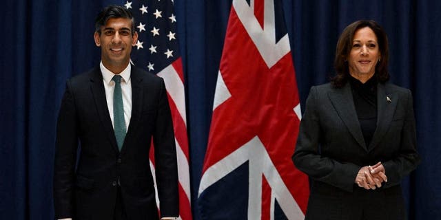 Britain's Prime Minister Rishi Sunak and Vice President Kamala Harris pose as they meet at the Munich Security Conference in Munich, Feb. 18, 2023.