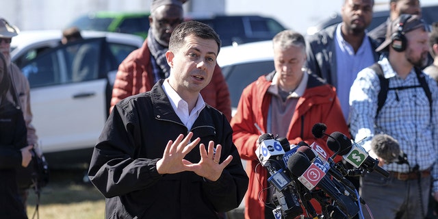 Pete Buttigieg, U.S. Secretary of Transportation, speaks at a press conference near the site of the Norfolk Southern train derailment in East Palestine, Ohio, USA, Thursday, February 23, 2023. 