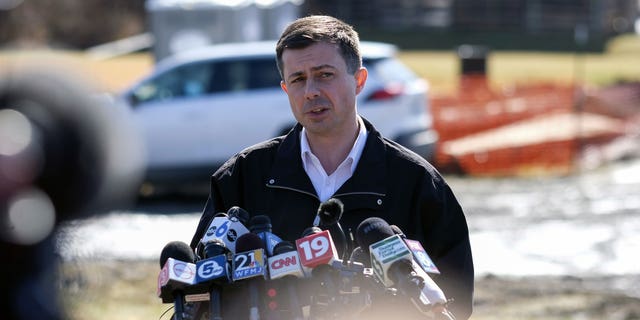 Pete Buttigieg speaks during a news conference near the site of the Norfolk Southern train derailment