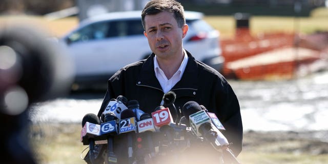 Pete Buttigieg speaks during a news conference near the site of the Norfolk Southern train derailment