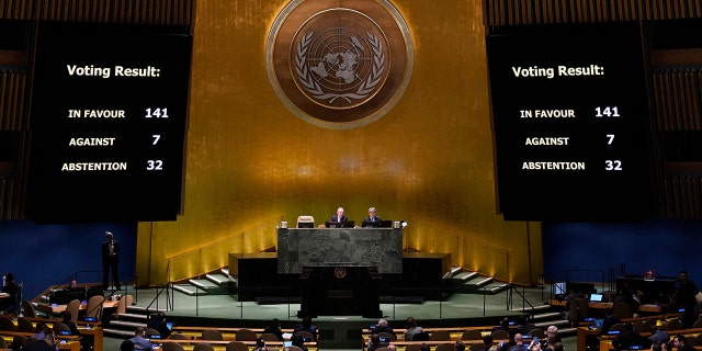 Screens display the vote count during the Eleventh Emergency Special Session of the General Assembly on Ukraine, at UN headquarters in New York City on February 23, 2023. 