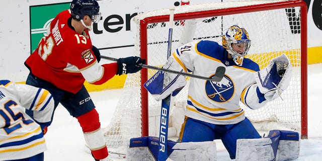 Goaltender Craig Anderson, #41 of the Buffalo Sabers, makes a save against Sam Reinhart, #13 of the Florida Panthers, at FLA Live Arena on February 24, 2023 in Sunrise, Florida. 