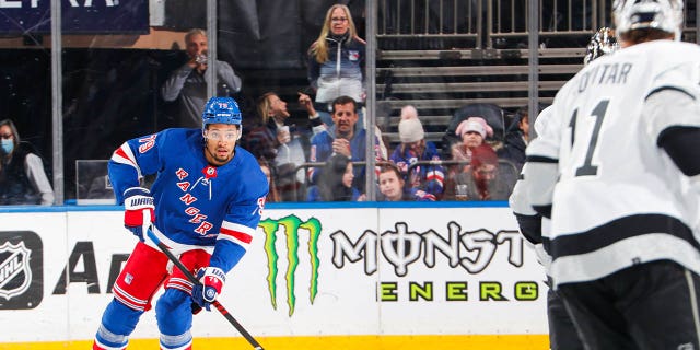 K'Andre Miller, #79 of the New York Rangers, skates with the puck against the Los Angeles Kings at Madison Square Garden on Feb. 26, 2023 in New York City.
