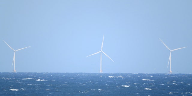 The Block Island wind farm is photographed from Long Island, New York, on April 16, 2021.