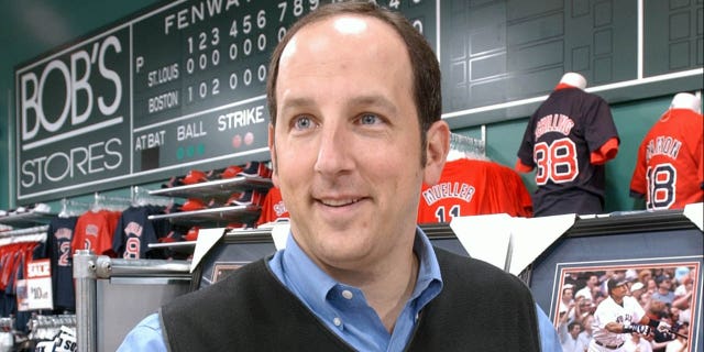 Boston Herald sports columnist Tony Massarotti signs copies of his new book "A Tale of Two Cities" at the new Bob's Store in Somerville grand opening April 28, 2005.