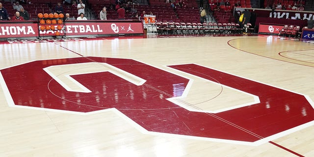 The Oklahoma Sooners logo on the floor before a basketball game against the Butler Bulldogs at the Lloyd Noble Center Dec. 7, 2021, in Norman, Okla.  