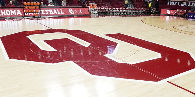 The Oklahoma Sooners logo on the floor before a basketball game against the Butler Bulldogs at the Lloyd Noble Center Dec. 7, 2021, in Norman, Okla.