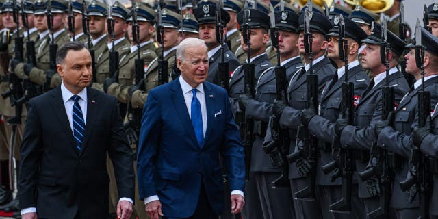 Polish President Andrzej Duda and President Biden inspects the Polish guard at the presidential Palace on March 26, 2022 in Warsaw, Poland. 