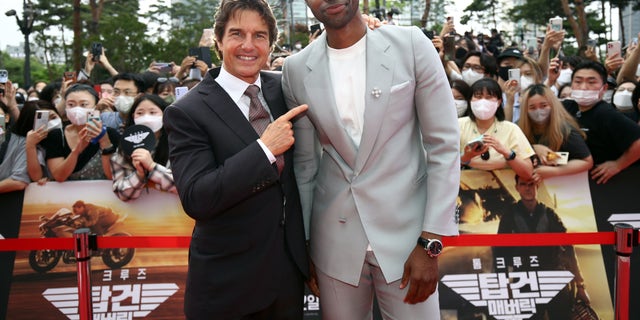 Tom Cruise and Jay Ellis attend the Korea Red Carpet for "Top Gun: Maverick" at Lotte World on June 19, 2022, in Seoul, South Korea.