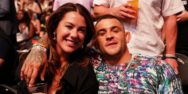 Dustin Poirier and his wife Jolie Poirier attend UFC 276 at T-Mobile Arena on July 2, 2022 in Las Vegas.
