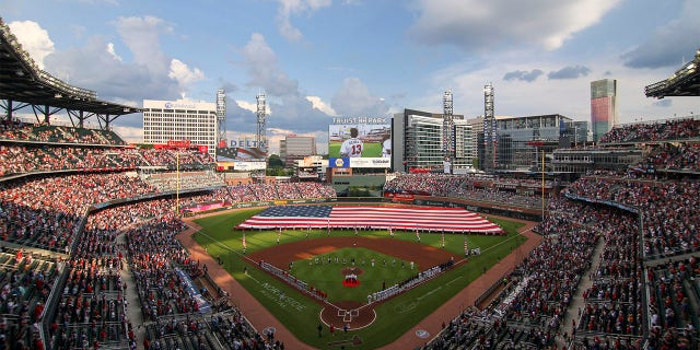 A general view of Truist Park during the National Anthem before a game between the Atlanta Braves and St. Louis Cardinals on July 4, 2022 in Atlanta.