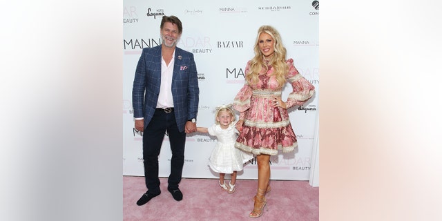 Slade Smiley and Gretchen Rossi are photographed with their daughter, Skylar Gray, in August.