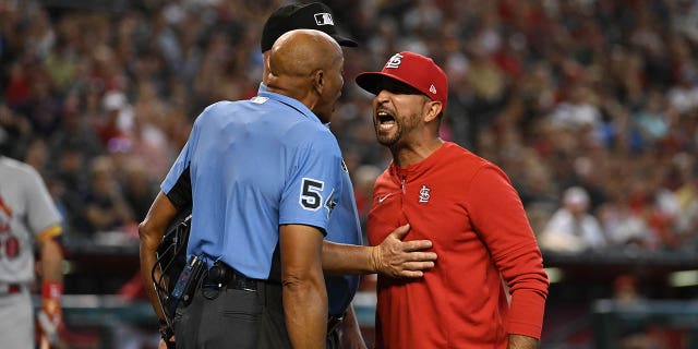 Cardinals manager Oliver Marmol blasts MLB umpire for poor sportsmanship: ‘He has zero class’ Manager Oliver Marmol of the St. Louis Cardinals, right, argues with home plate umpire C.B. Bucknor after being ejected during the third inning of a game against the Arizona Diamondbacks at Chase Field on Aug. 21, 2022, in Phoenix.