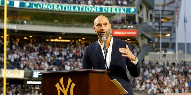 Baseball Hall of Famer Derek Jeter speaks to the fans as he is honored by the New York Yankees before a game against the Tampa Bay Rays at Yankee Stadium on Sept. 9, 2022 in the Bronx borough of New York City.