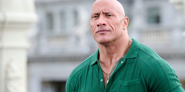 Dwayne Johnson joked he has "a lot of guns" while going through a security check ahead of an XFL game, referring to his biceps.
