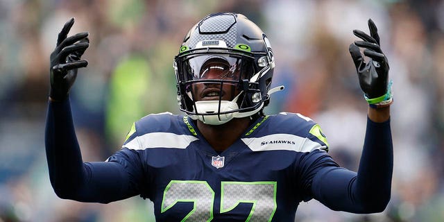 Tariq Woolen of the Seattle Seahawks reacts during the first quarter against the New York Giants at Lumen Field on October 30, 2022 in Seattle. 
