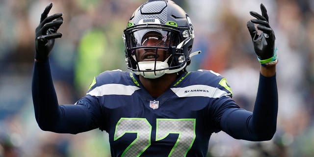 Tariq Woolen of the Seattle Seahawks reacts during the first quarter against the New York Giants at Lumen Field on October 30, 2022 in Seattle. 