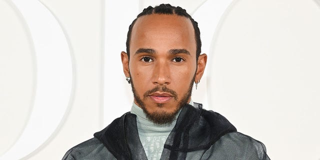 Lewis Hamilton attends the Dior Fall 2023 Menswear Show Dec. 3, 2022, in Giza, Egypt. 