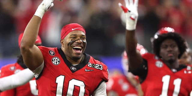 Jamon Dumas-Johnson, number 10 of the Georgia Bulldogs, celebrates in the fourth quarter against the TCU Horned Frogs in the college football national championship game at SoFi Stadium on January 9, 2023 in Inglewood, California. 