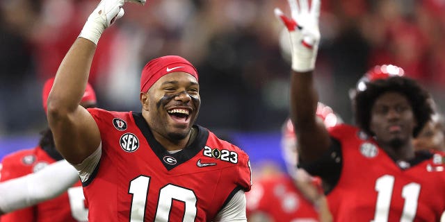 Jamon Dumas-Johnson, number 10 of the Georgia Bulldogs, celebrates in the fourth quarter against the TCU Horned Frogs in the college football national championship game at SoFi Stadium on January 9, 2023 in Inglewood, California. 