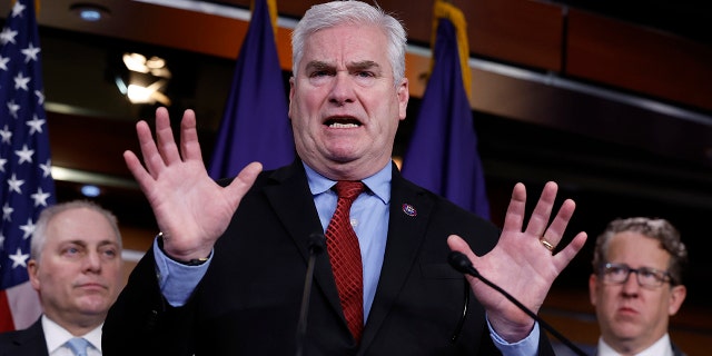 Flanked by House Majority Leader Steve Scalise, R-LA, and Rep. Adrian Smith, R-NE, House Majority Whip Tom Emmer, R-Minn., talks to reporters during a news conference following a GOP caucus meeting at the U.S. Capitol on January 10, 2023 in Washington, DC. 